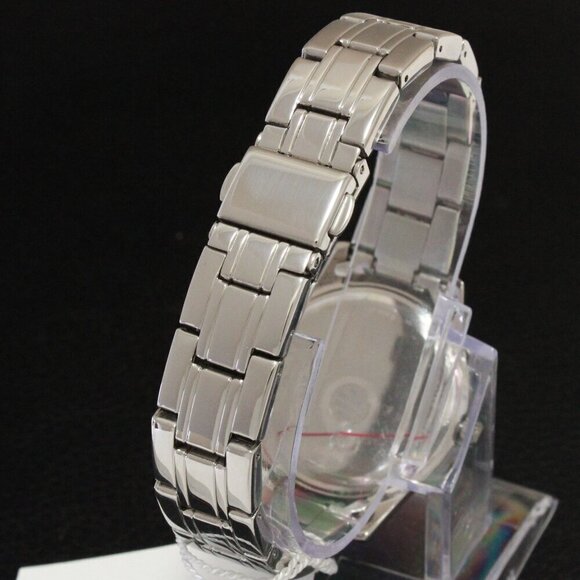 Caravelle Ladies Watch Crystal Studded Bezel Textured Dial Rose Hands 32mm